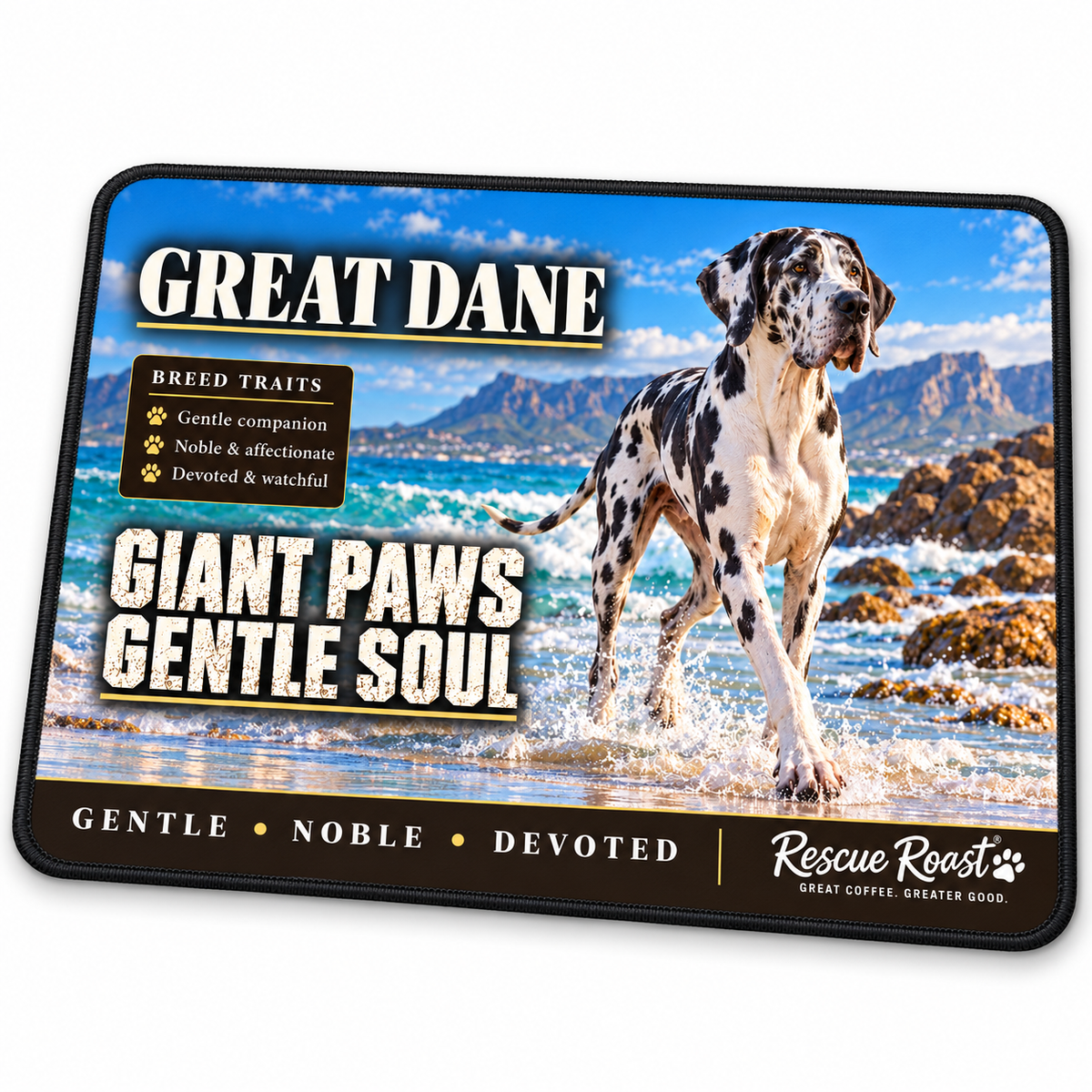 Rescue Roast® Great Dane mousepad: Harlequin Great Dane walking through surf with mountains behind, with the words “Giant Paws, Gentle Soul”