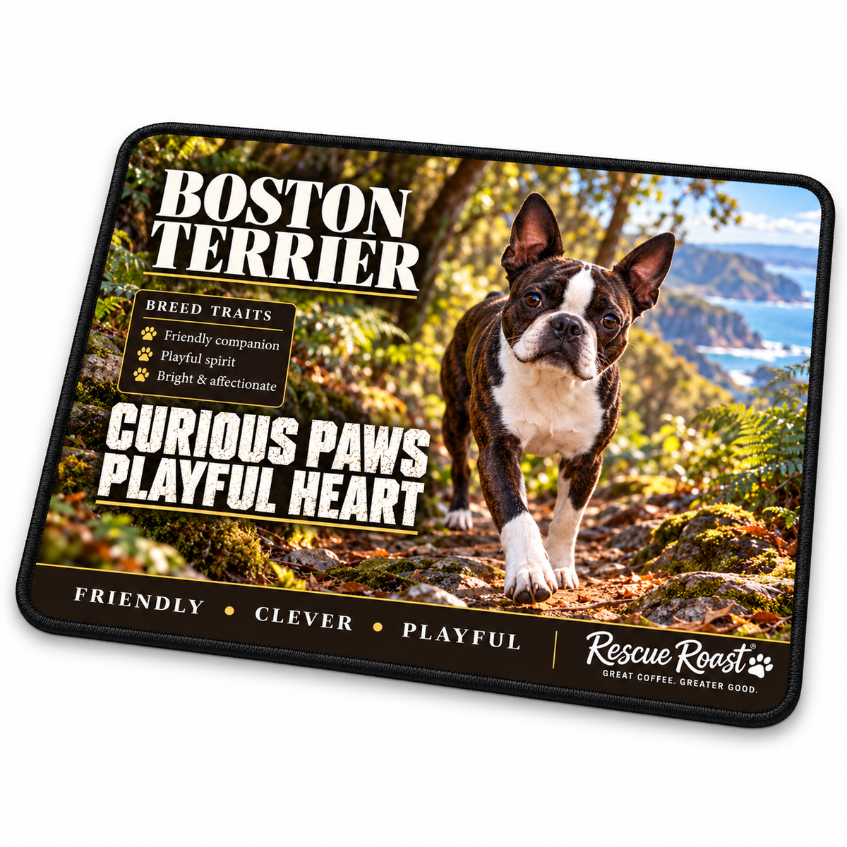 Rescue Roast® Boston Terrier mousepad — Curious Paws, Playful Heart. A brindle Boston Terrier walks along a fern-lined woodland path overlooking a rocky coast.