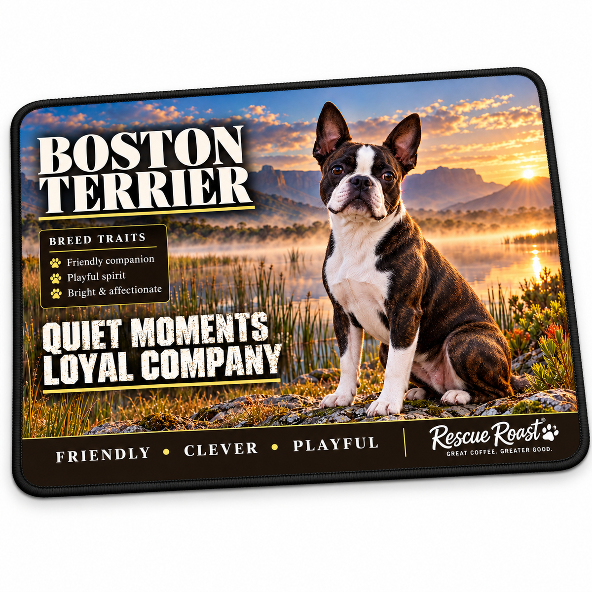 Rescue Roast® Boston Terrier mousepad — Quiet Moments, Loyal Company. A brindle Boston Terrier sits on rocks beside a misty lake and reeds at mountain sunset.