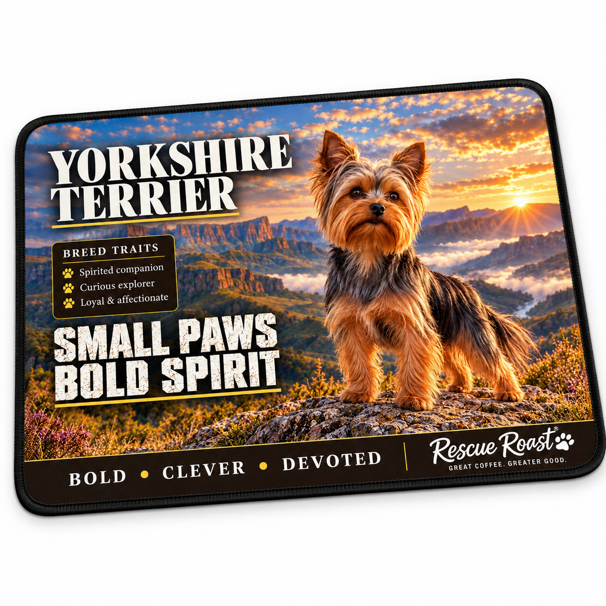 Rescue Roast Yorkshire Terrier mousepad: A Yorkshire Terrier stands on a rocky lookout above a misty mountain valley at sunset. Printed slogan: Small Paws, Bold Spirit.