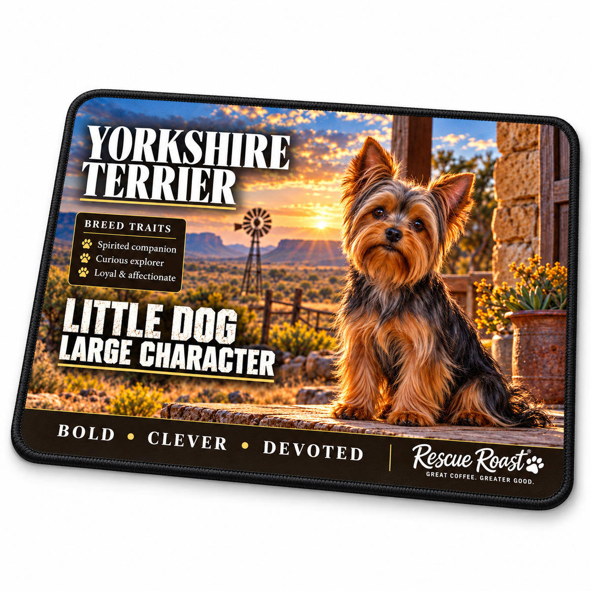 Rescue Roast Yorkshire Terrier mousepad: A Yorkshire Terrier sits on a rustic farmhouse stoep, with a windmill and mountain landscape glowing at sunset. Printed slogan: Little Dog, Large Character.